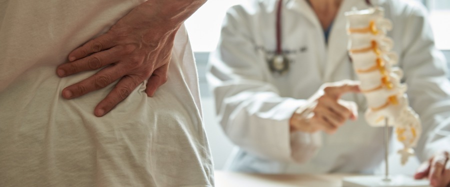 Doctor talking to patient about osteoporosis