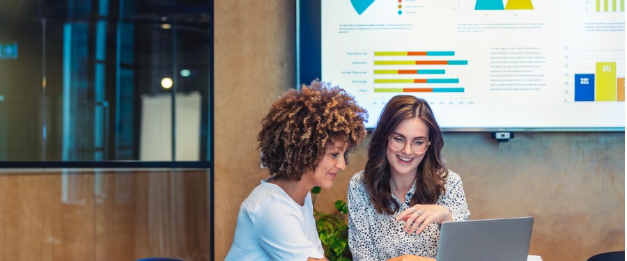 Two women discussing Antidote Match data