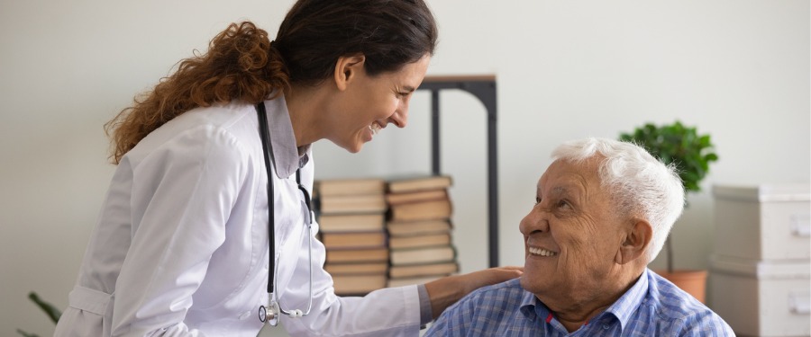 Doctor discussing type 1 diabetes clinical trials with Hispanic patient