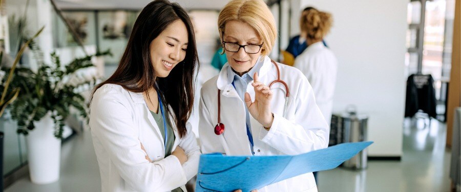 two doctors discussing diabetes clinical trials